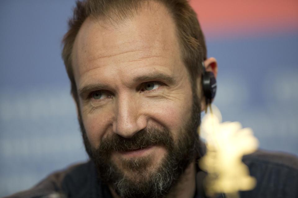 Actor Ralph Fiennes listens to journalists questions at the press conference for the film The Grand Budapest Hotel during the International Film Festival Berlinale, in Berlin, Thursday, Feb. 6, 2014. (AP Photo/Axel Schmidt)