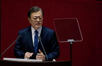 FILE PHOTO: South Korean President Moon Jae-in speaks at the National Assembly in Seoul