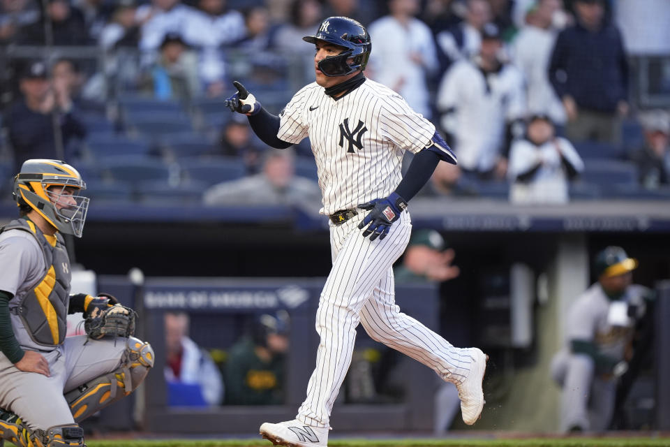 New York Yankees' Jose Trevino crosses home plate after hitting a home run against the Oakland Athletics during the second inning of a baseball game Thursday, April 25, 2024, in New York. (AP Photo/Bryan Woolston)