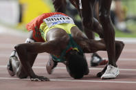 Muktar Edris, of Ethiopia reacts after winning the gold medal in the men's 5000 meter final at the World Athletics Championships in Doha, Qatar, Monday, Sept. 30, 2019. (AP Photo/Petr David Josek)