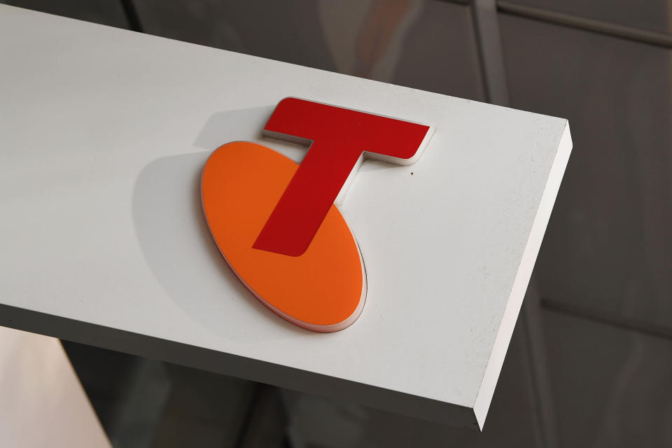 An orange and red Telstra logo. Image: Getty