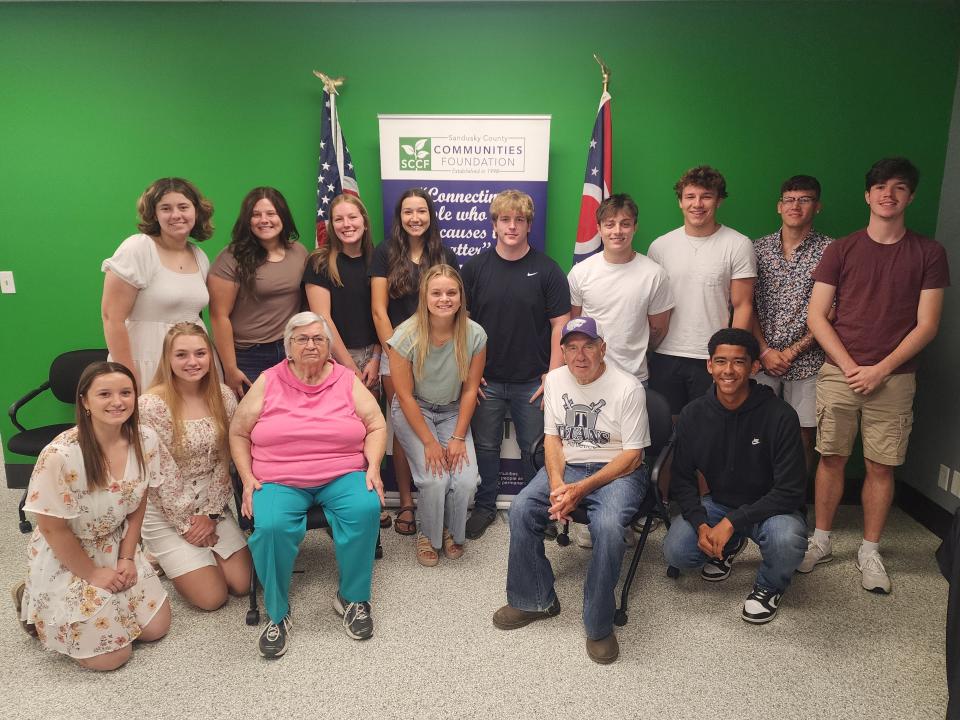 The Bergers take a photo with some of the recipients of the Dick and Barb Berger Athletic Scholarship and Charitable Fund of the Sandusky County Communities Foundation.