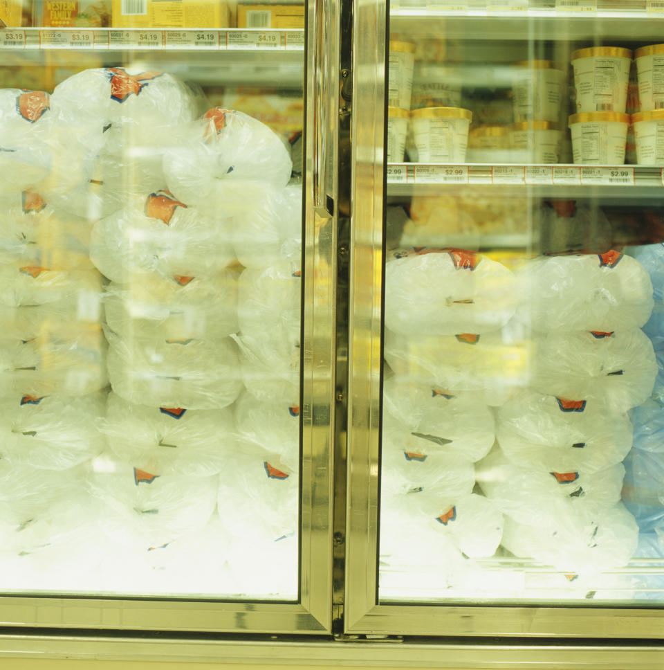 Bags of ice in a freezer