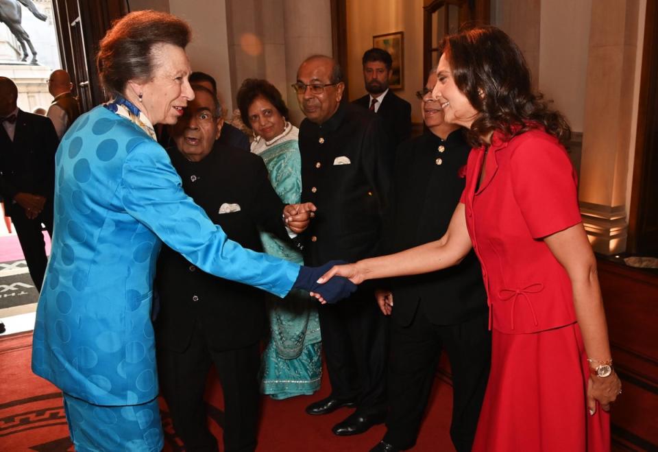 Princess Anne shakes hands with Gopichand P Hinduja, Chairperson of the Hinduja Group, at the inauguration (Dave Benett/Getty Images for Raf)