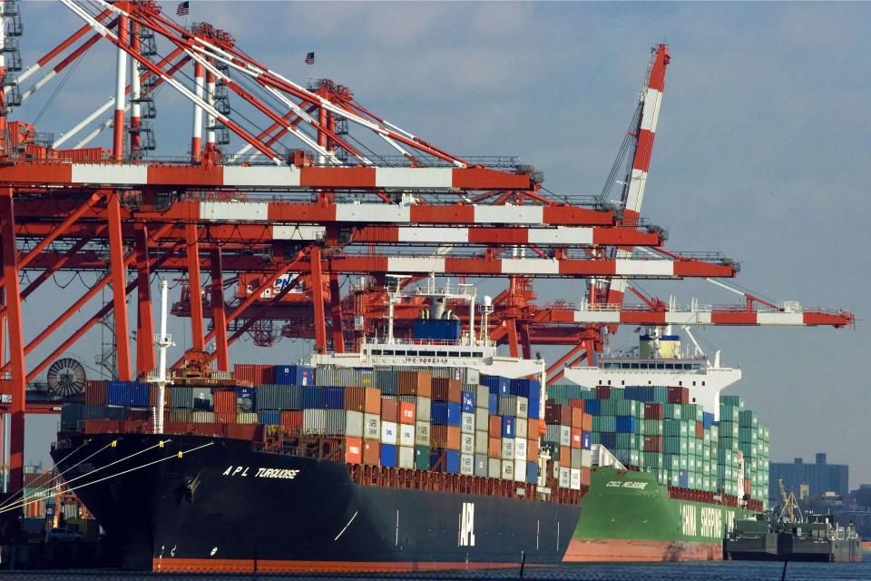 Shipping containers lie stacked on a ship docked at the Port Newark Container Terminal, the third-largest cargo terminal in New York harbor on February 21, 2006, in Newark, New Jersey.