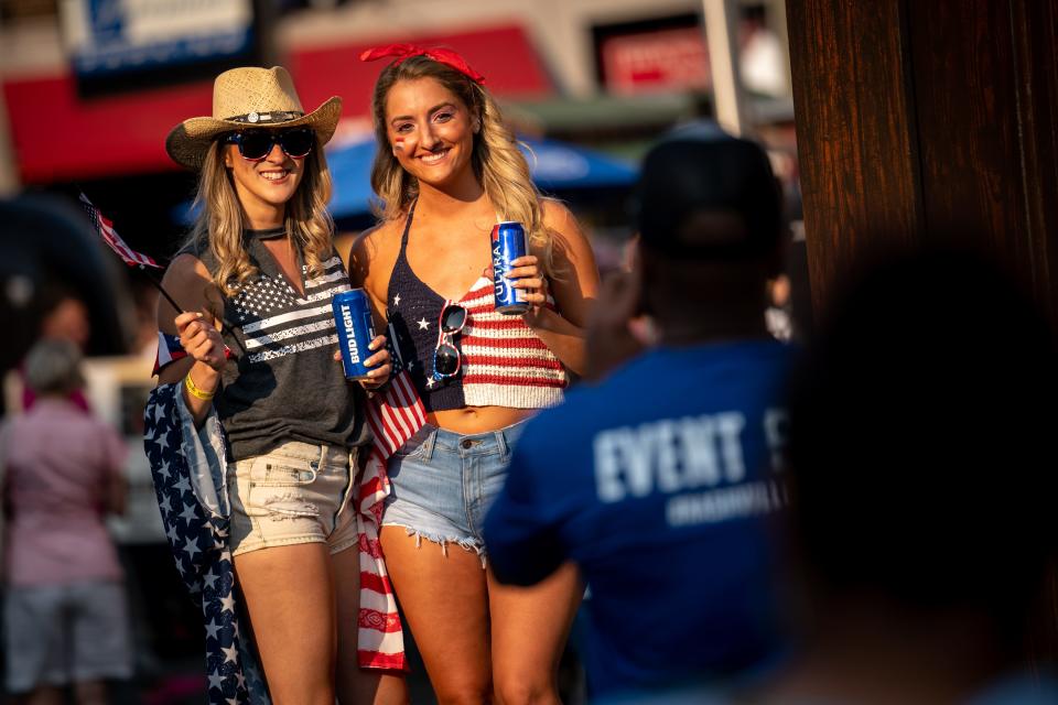 Tiffany Cocozza, left, and Alexis Cunzio, right, pose for a photo during the 2021 Let Freedom Sing! celebration July 4, 2021, in Nashville.