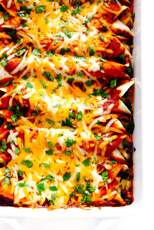 <p>These chicken enchilada recipe is easy to make, customizable with your favorite fillings, and are always a crowd favorite.</p><p><strong>Get the recipe: <a href="https://www.gimmesomeoven.com/best-chicken-enchiladas-ever/" rel="nofollow noopener" target="_blank" data-ylk="slk:Best Chicken Enchiladas;elm:context_link;itc:0;sec:content-canvas" class="link ">Best Chicken Enchiladas</a></strong></p>