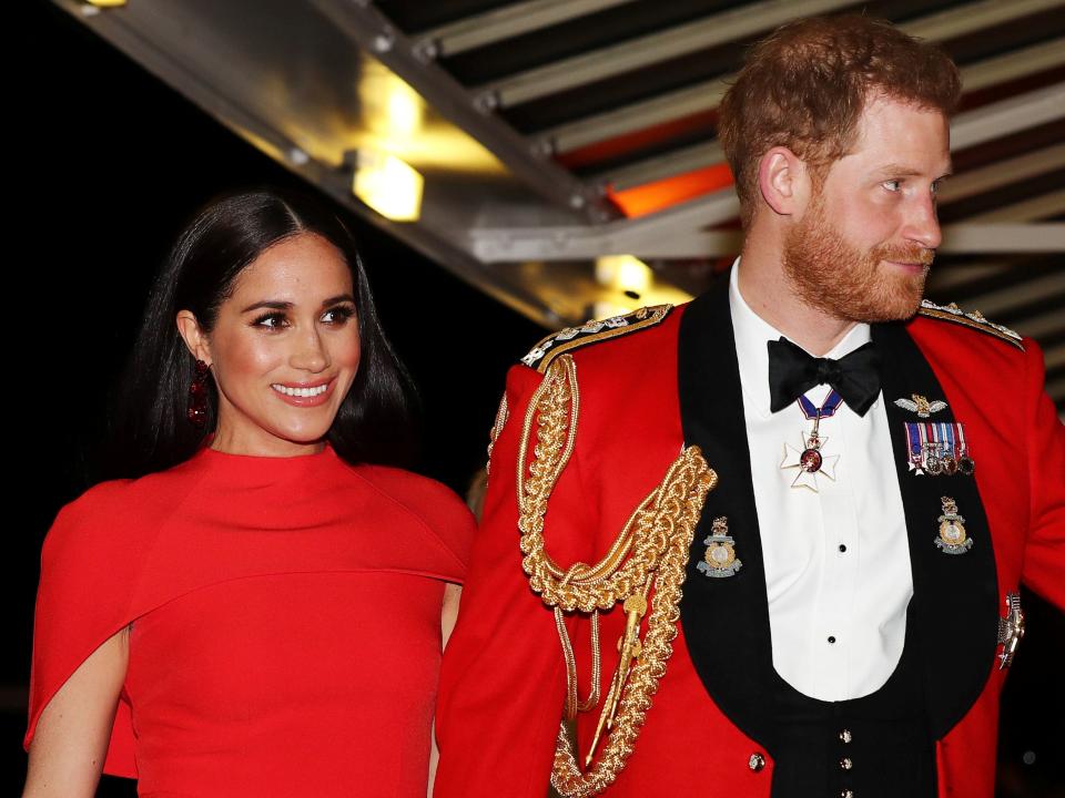 meghan markle prince harry red outfits