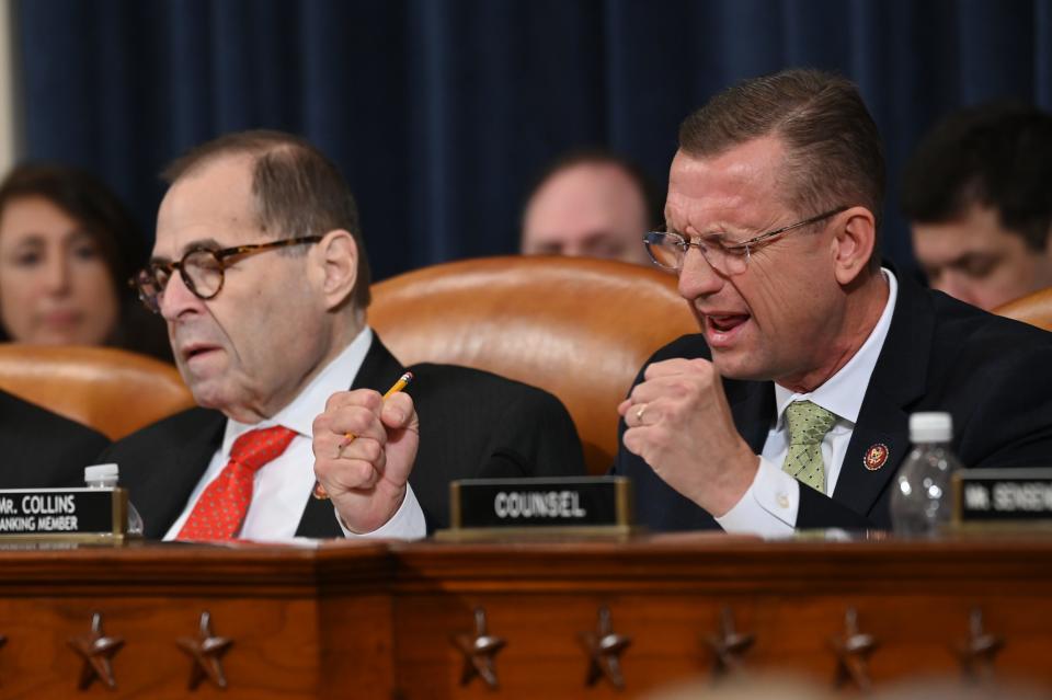 House Judiciary Committee ranking member Rep. Doug Collins, R-Ga., right, speaks as Chairman Rep. Jerrold Nadler, D-N.Y., listens during the markup of H.Res. 755, Articles of Impeachment Against President Donald J. Trump in Washington, DC on Dec. 12, 2019.