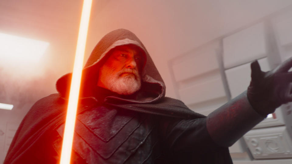 Ray Stevenson's Baylan Skoll wielding lightsaber in Ahsoka