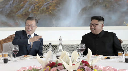 South Korean President Moon Jae-in and North Korean leader Kim Jong Un attend a luncheon in Pyongyang, North Korea, September 19, 2018. Pyeongyang Press Corps/Pool via REUTERS