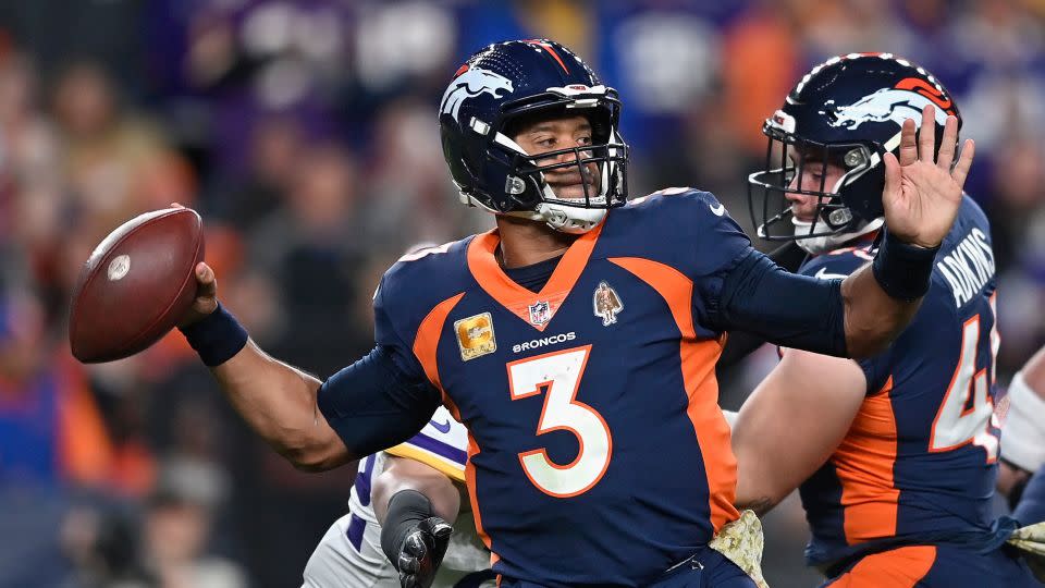 Wilson throws a deep pass during the second quarter of the Broncos' game against the Minnesota Vikings on November 19, 2023. - Dustin Bradford/Getty Images