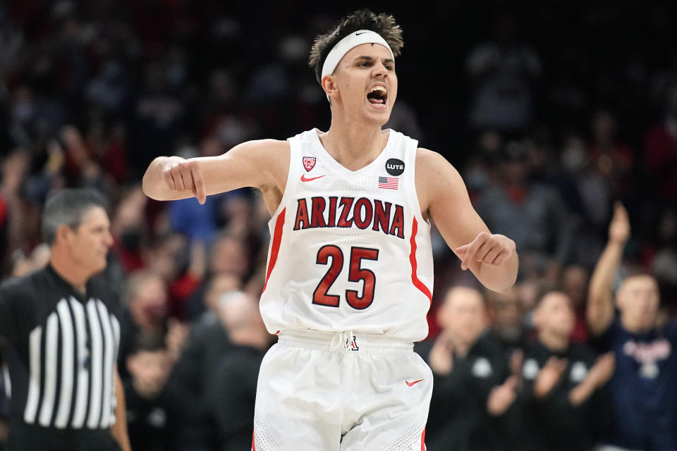 Arizona guard Kerr Kriisa (25) reacts after scoring against California Baptist during the second half of an NCAA college basketball game, Saturday, Dec. 18, 2021, in Tucson, Ariz. Arizona won 84-60. (AP Photo/Rick Scuteri)