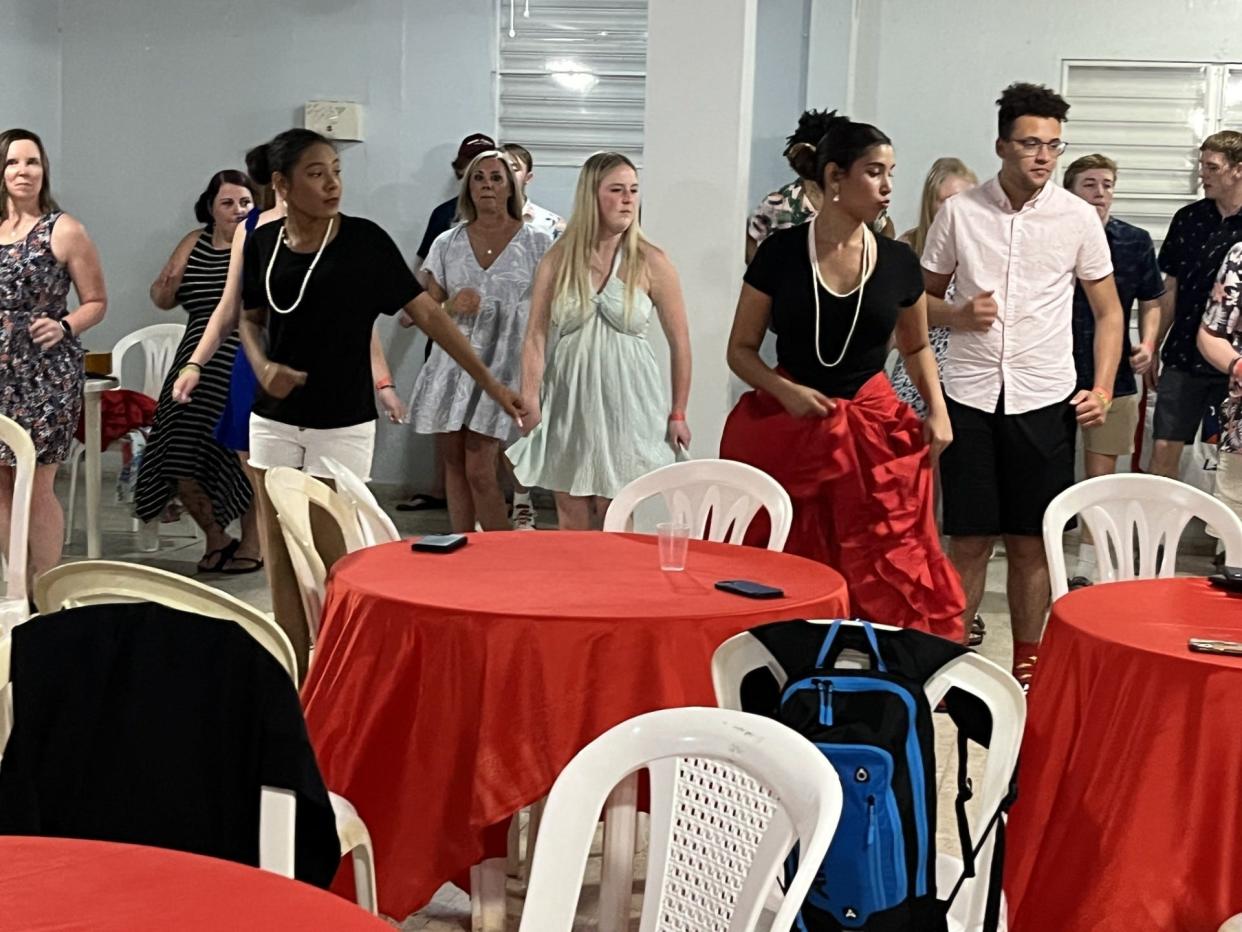 Students participant in an interactive folkloric dance show about the history of Puerto Rico, told through dance. It was performed in Lajas, Puerto Rico by the Ballet Teatro Guaitiano.