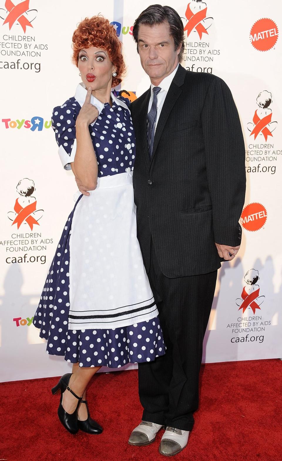 Lisa Rinna and Harry Hamlin at Barker Hangar on October 30, 2010 in Santa Monica, California.