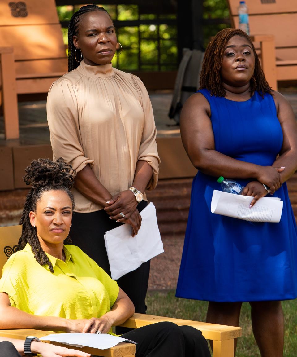 Dr. Stephanie Mitchell, from left, Dr. Yashica Robinson and Dr. Heather Skanes look on Tuesday as midwives and doctors announce a lawsuit, along with the ACLU, challenging Alabama Department of Public Health’s actions against birth centers in the state.