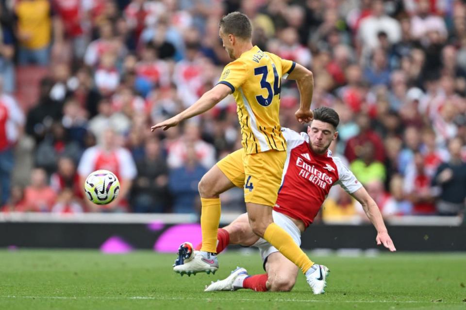 Rice was booked in the first half for a late tackle on Veltman (Getty Images)