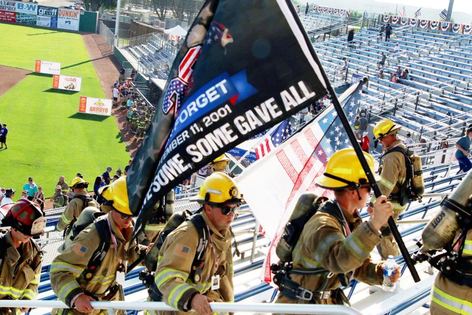 Local and area firefighters, as well as several hundred volunteers, take part in the annual 9/11 stair climb in 2021 at Ricketts Park. The event raised more than $50,000 which went to the National Fallen Firefighters Foundation.