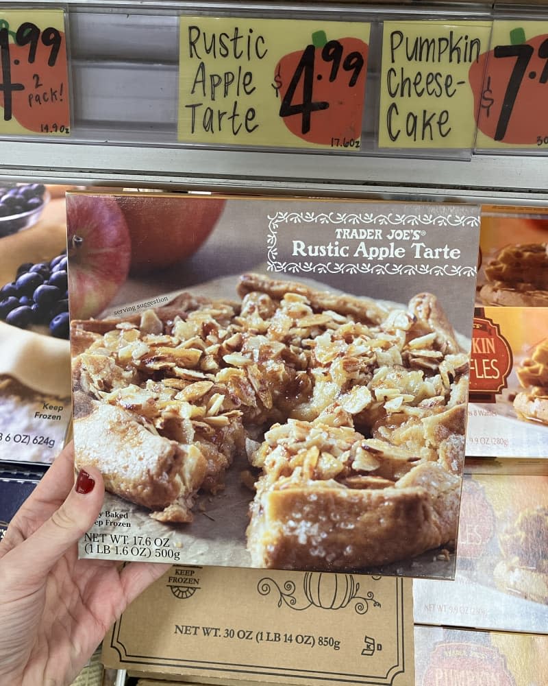 someone holding Rustic Apple Tarte at Trader Joe's store