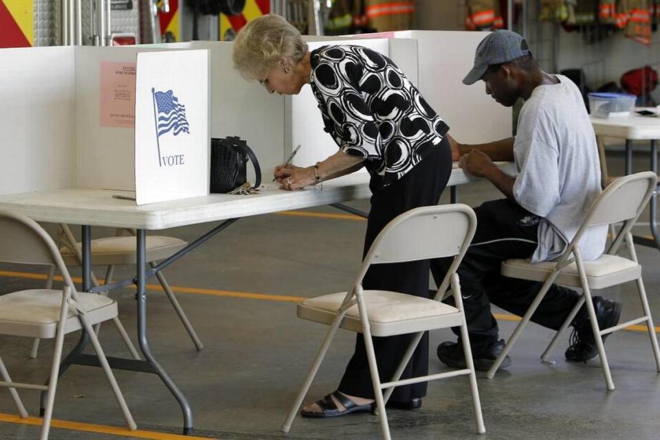 Voters cast their ballots at Clayton Fire Station, Johnston Co. Precinct 10A, on West Horne St. in downtown Clayton NC in this 2014 file photo.