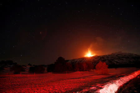 Italy's Mount Etna, Europe's tallest and most active volcano, spews lava as it erupts on the southern island of Sicily, Italy February 28, 2017. REUTERS/Antonio Parrinello