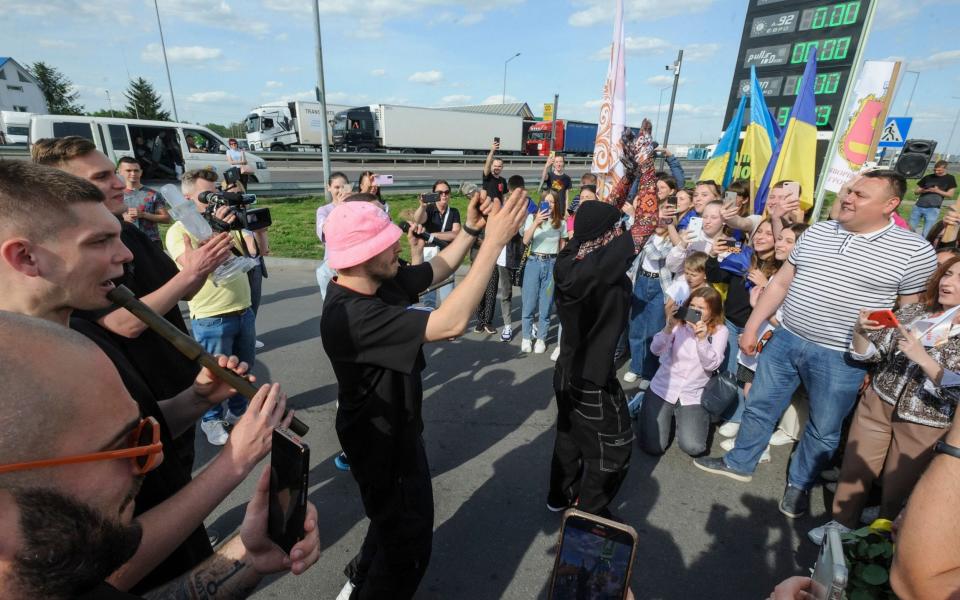 Ukrainians meet members of the Ukrainian band Kalush Orchestra after they crossed the Polish-Ukrainian border in Lviv -  MYKOLA TYS/EPA-EFE/Shutterstock