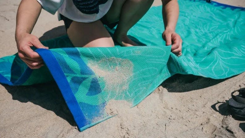 We tested beach towels for water absorption, stain releasing and of course, sand retention.