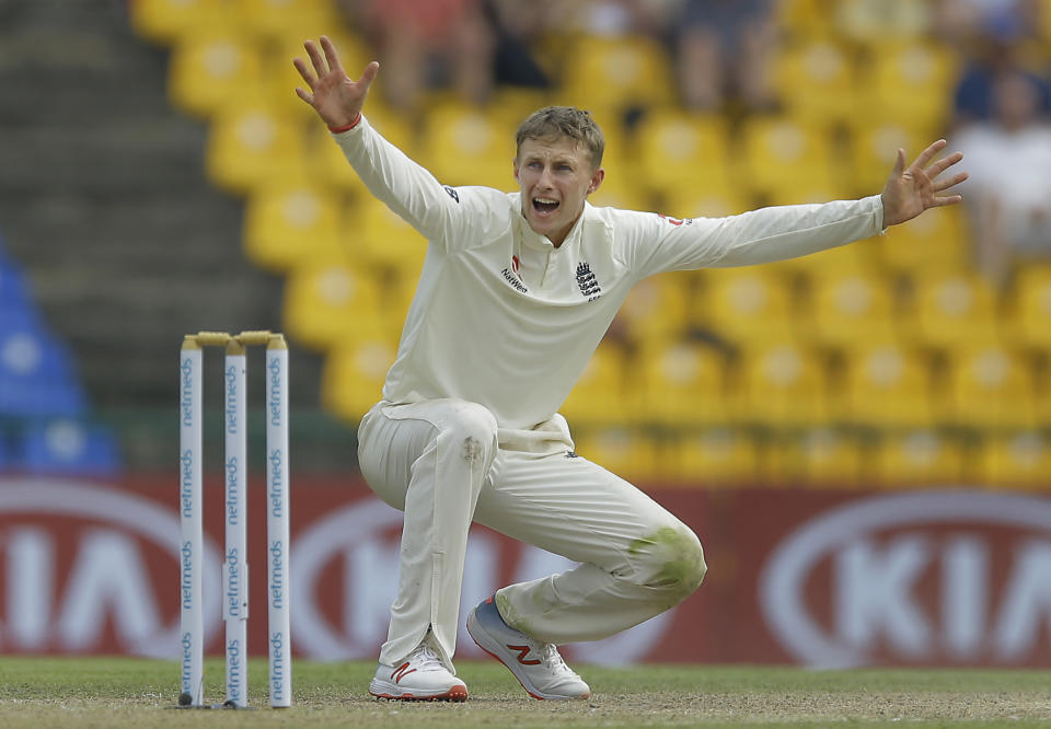 England's captain Joe Root unsuccessfully appeals for the wicket of Sri Lanka's Dilruwan Perera during the second day of the second test cricket match between Sri Lanka and England in Pallekele, Sri Lanka, Thursday, Nov. 15, 2018. (AP Photo/Eranga Jayawardena)