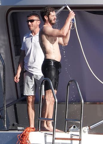 <p>COBRA TEAM / BACKGRID</p> Andrew Garfield takes to the waters during his sun-drenched holiday out in Positano, Italy.