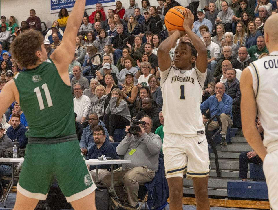 Freehold’s Qua’Mir Everett takes an outside shot. Ramapo Boys Basketball vs Freehold Borough for NJSIAA Group 3 Title inToms River, NJ on March 10, 2024.