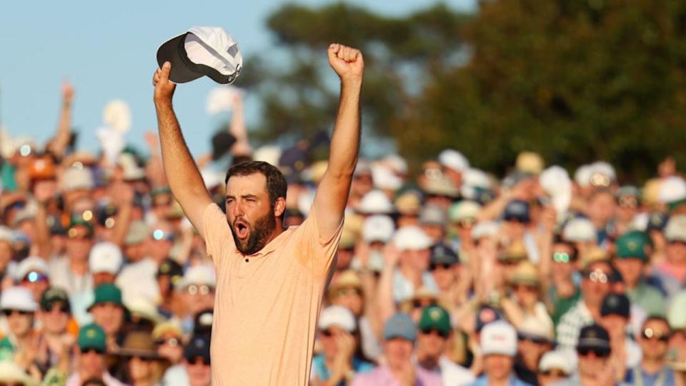 Scottie Scheffler, the world's No. 1 men's golfer, celebrates after earning his second green jacket on Sunday.