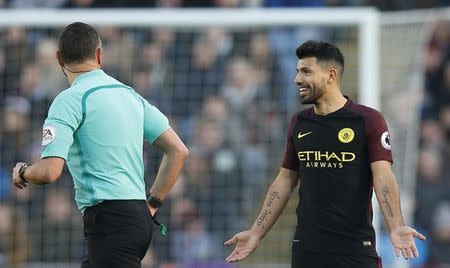Football Soccer Britain - Burnley v Manchester City - Premier League - Turf Moor - 26/11/16 Manchester City's Sergio Aguero with referee Andre Marriner Reuters / Andrew Yates Livepic