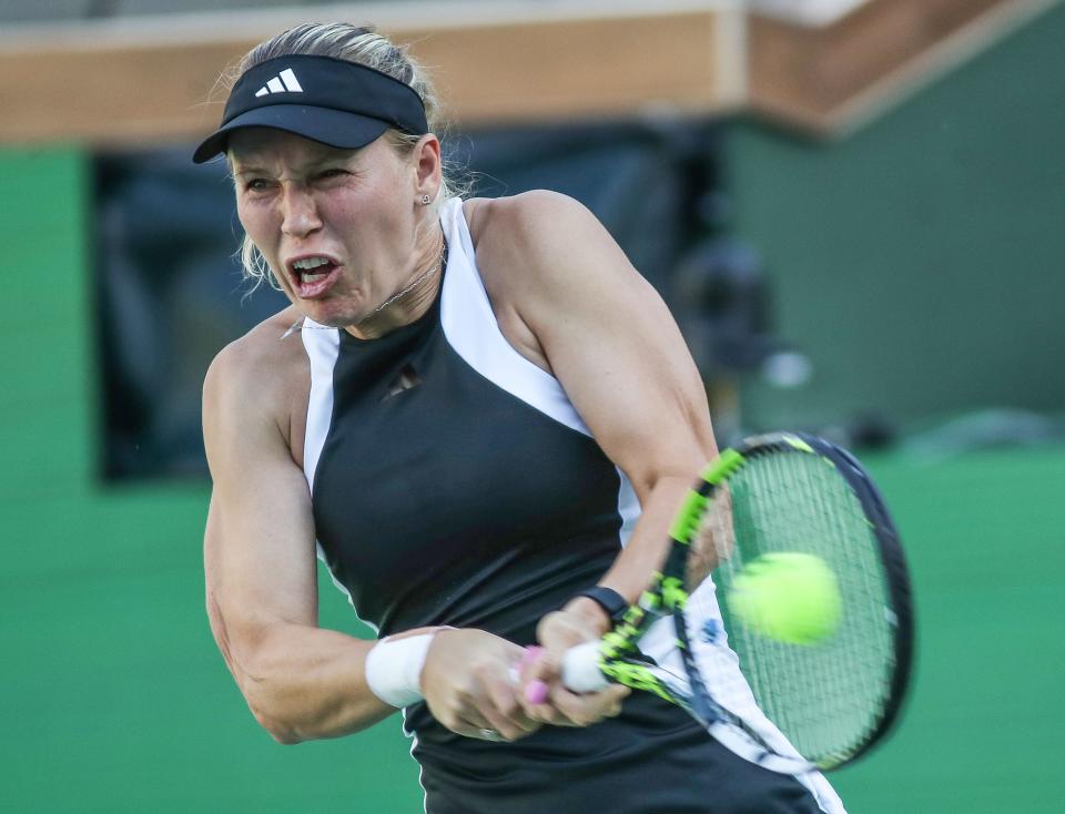 Caroline Wozniacki hits a shot in her match against Donna Vekic during the BNP Paribas Open in Indian Wells, Calif., March 8, 2024.