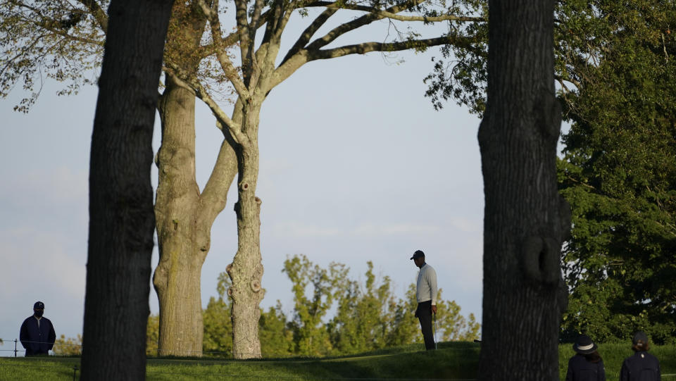 Tiger Woods, of the United States, lines up a shot on the fifth green during the second round of the US Open Golf Championship, Friday, Sept. 18, 2020, in Mamaroneck, N.Y. (AP Photo/John Minchillo)