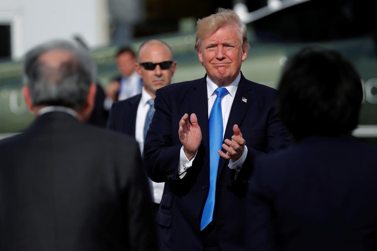 President Donald Trump, seen preparing to return to the U.S. from the Philippines on Tuesday, credited himself for helping three UCLA students dodge 10 years in prison. (Photo: Jonathan Ernst / Reuters)