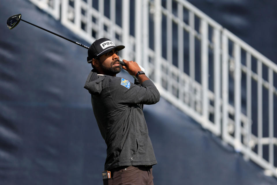 Sahith Theegala tees off on the first hole during the first round of the PGA Championship golf tournament at Oak Hill Country Club. Mandatory Credit: Aaron Doster-USA TODAY Sports