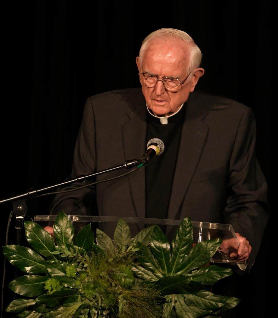 Rev. Joseph Breen delivers remarks at the memorial service for Max Barry, son of Mayor Megan Barry, at the Belcourt Theatre in Nashville, Tenn. Tuesday, Aug. 1, 2017.