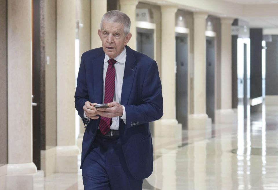 Jim McIngvale makes his way to a Harris County Courtroom for the first day of the trial to overturn a Harris County election from November at Harris County Civil Courthouse on Tuesday, Aug. 1, 2023, in Houston. McIngvale filed a lawsuit against Harris County Elections office for access to 2022 Election Day records. (Elizabeth Conley/Houston Chronicle via AP)