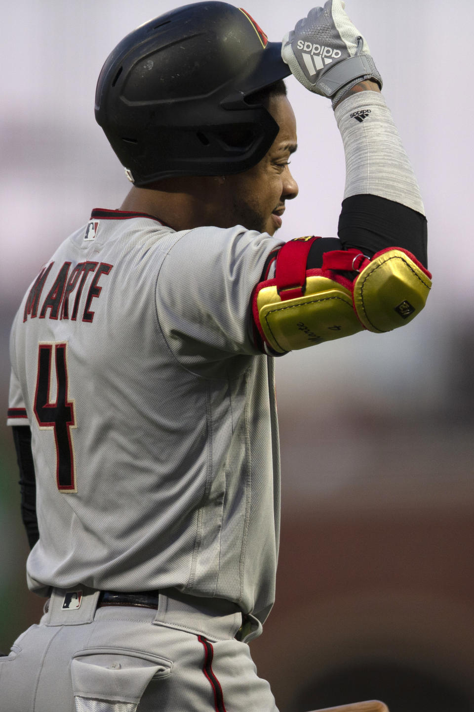 Arizona Diamondbacks second baseman Ketel Marte (4) walks back to the dugout after striking out against San Francisco Giants starting pitcher Logan Webb during the first inning of a baseball game, Tuesday, Sept. 28, 2021, in San Francisco. (AP Photo/D. Ross Cameron)