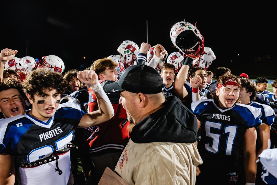 Garaway celebrates their 42-7 win against West Jefferson during the Division VI, Region 23 final, Friday, Nov. 17 at John D. Sulsberger Memorial Stadium in Zanesville, Ohio.