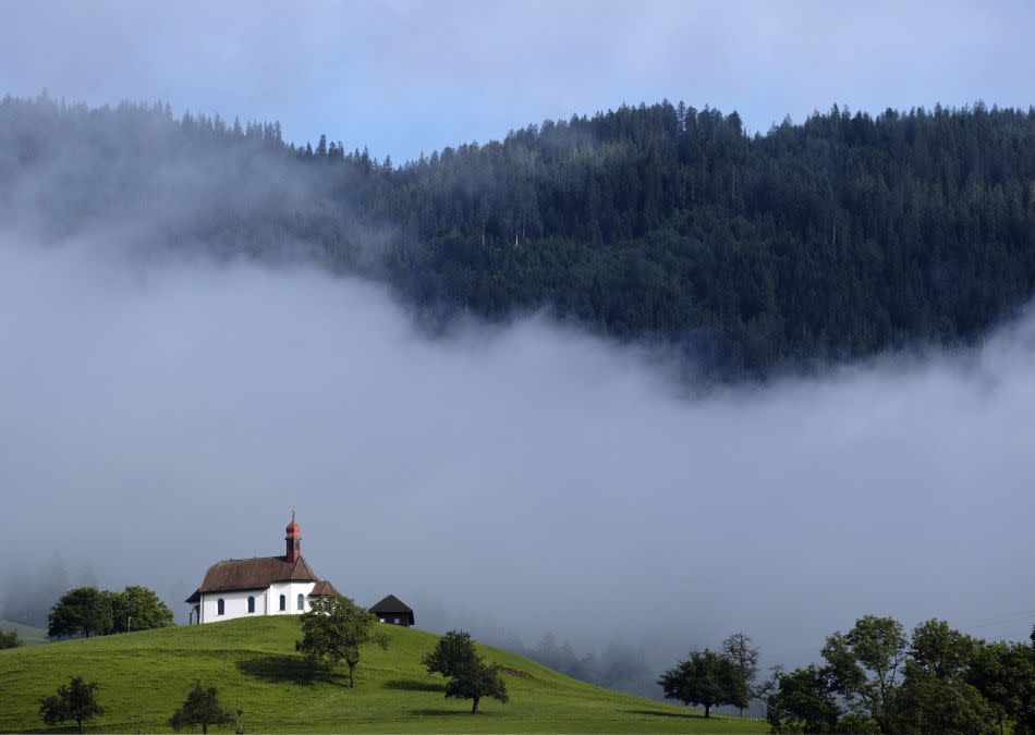 A church is pictured in the early morning on a mountain in Sarnen, central Switzerland.