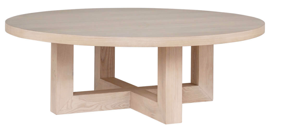 round wooden coffee table with square legs from freedom