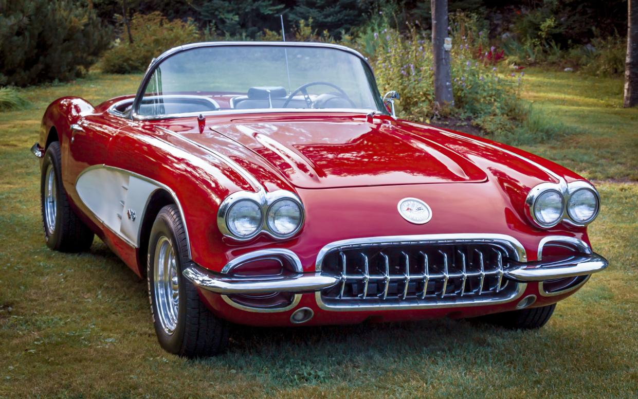 Halifax, Nova Scotia, Canada :August 12, 2007 : First generation Corvette,  1960 Chevrolet Corvette in residential backyard after a good polishing, Halifax, Nova Scotia, Canada.