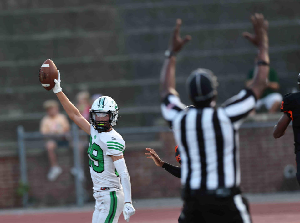 Hamilton Badin wide receiver Aidan Brown (29) scores a touchdown during a football game between Withrow and Badin high schools Friday, Sept. 2, 2022.