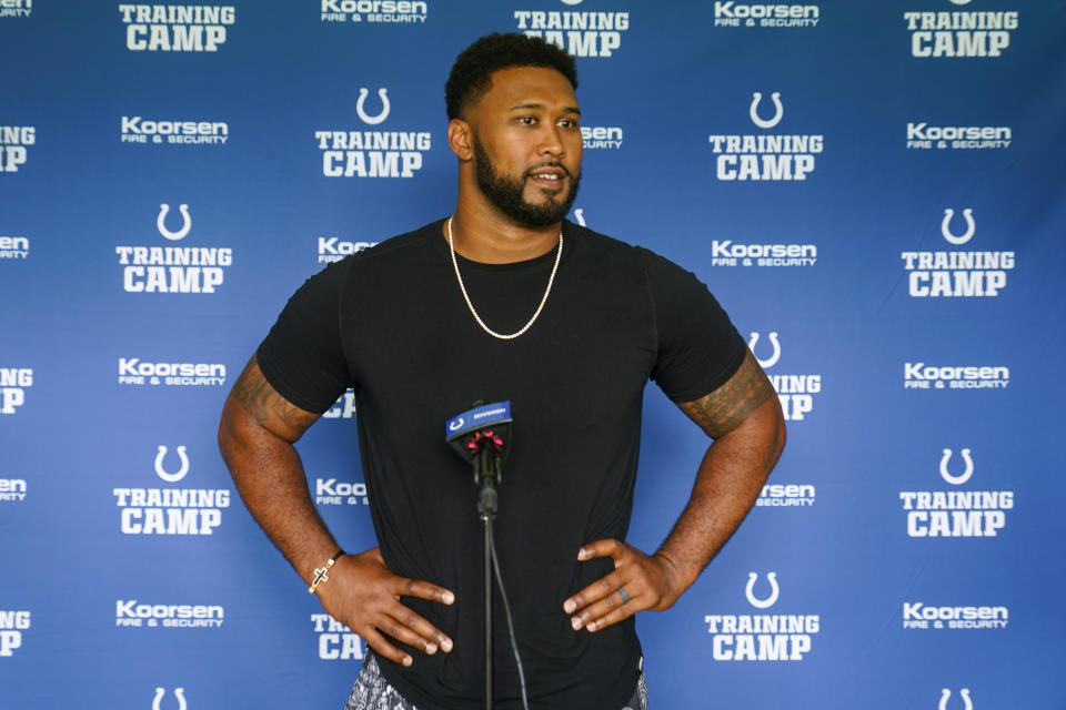 Indianapolis Colts defensive tackle DeForest Buckner speaks with the media at the NFL team's football training camp in Westfield, Ind., Tuesday, July 25, 2023. The Colts open practice on Wednesday. (AP Photo/Michael Conroy)