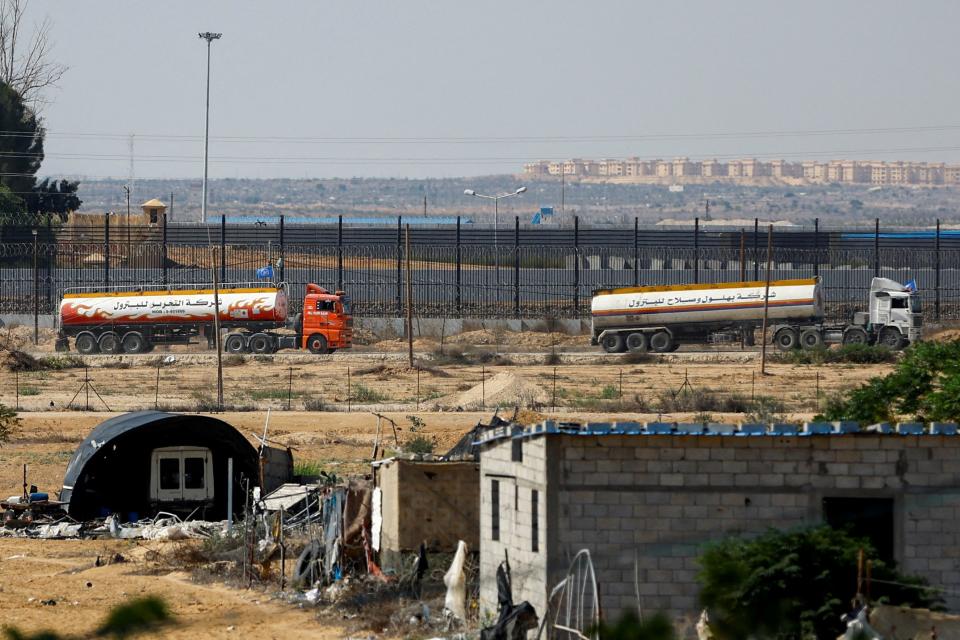 UN-flagged fuel trucks, pictured in October, near the crossing with Gaza (REUTERS/Ibraheem Abu Mustafa)