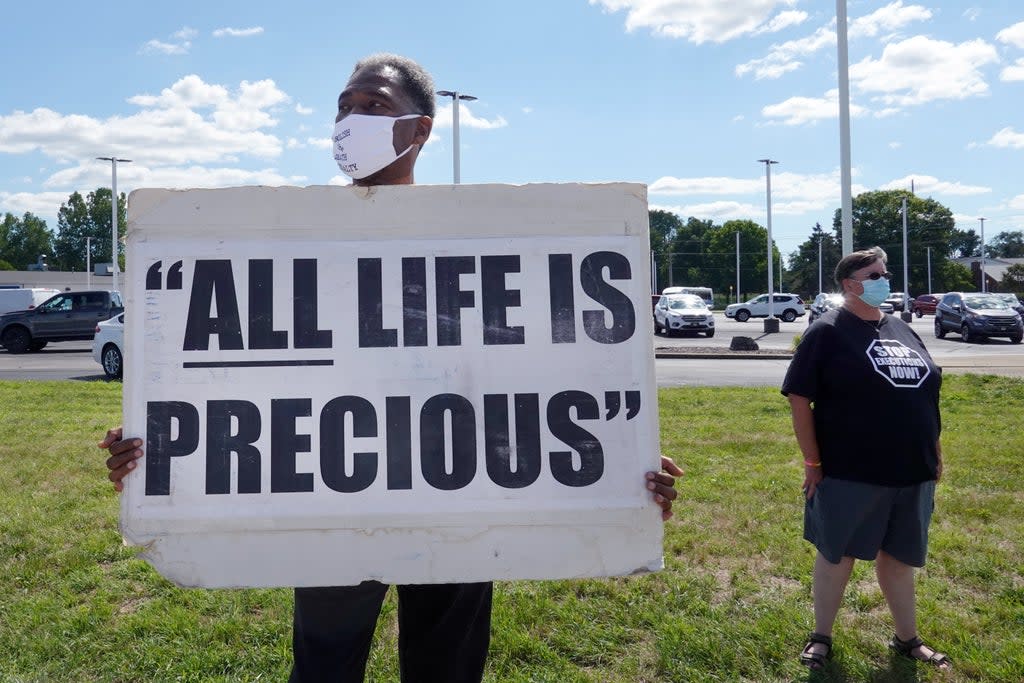 Sylvester Edwards expresses his opposition to the death penalty during a protest near the Federal Correctional Complex where Daniel Lewis Lee was scheduled to be executed on July 13, 2020 in Terre Haute, Indiana. (Photo by Scott Olson/Getty Images) (Getty Images)