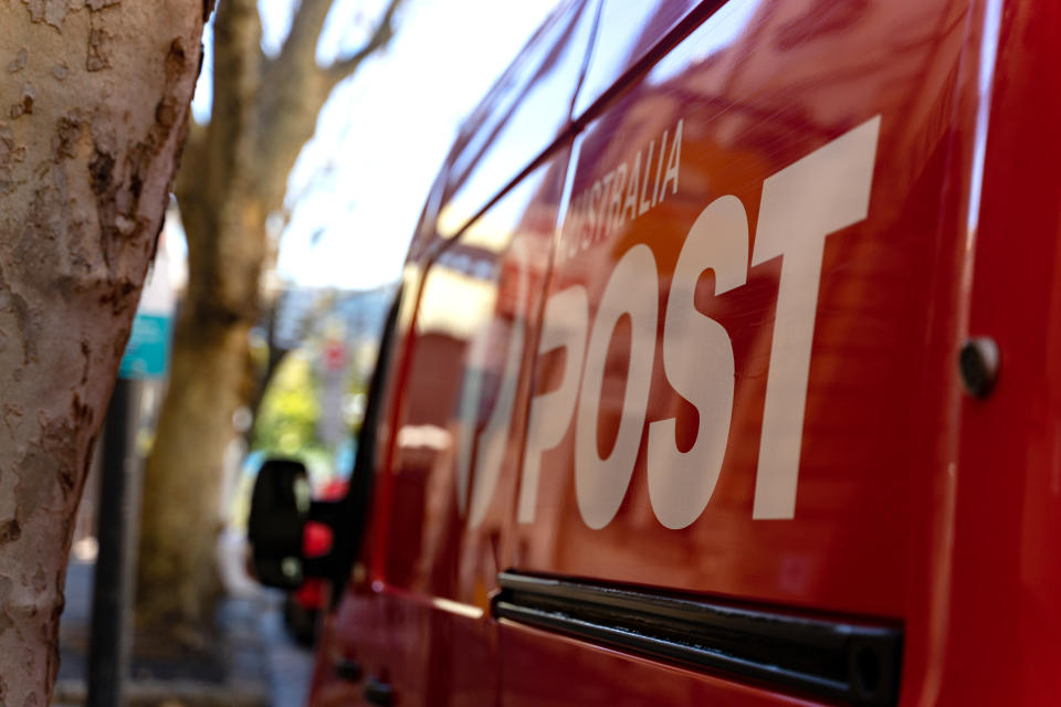 Australia post delivery truck showing logo. Source: Getty Images