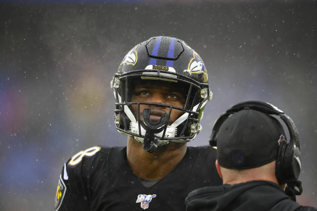 Baltimore Ravens quarterback Lamar Jackson (8) gestures in the second half  of an NFL football game against the San Francisco 49ers, Sunday, Dec. 1,  2019, in Baltimore, Md. (AP Photo/Nick Wass Stock