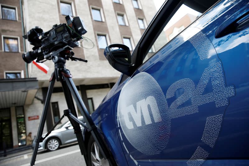 Logo of TVN24, a US-owned news channel, is pictured on a car in Warsaw